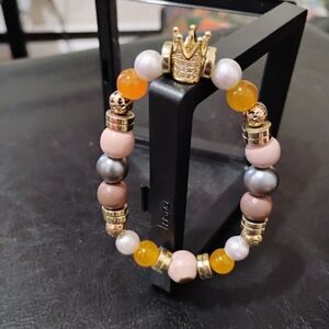 Elegant Gold and Orange Beaded Bracelet